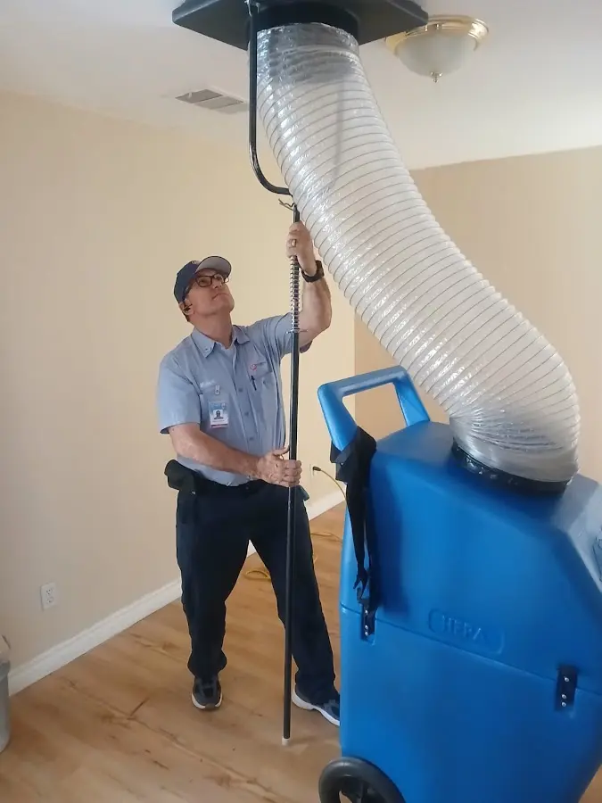Mini Split Installation technician using HEPA equipment in Nogales